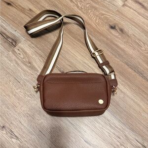 Modern and chic Crossbody Bag with Striped Strap